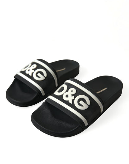 Dolce & Gabbana Chic Logo-Embossed Black Slides for Elegant Comfort